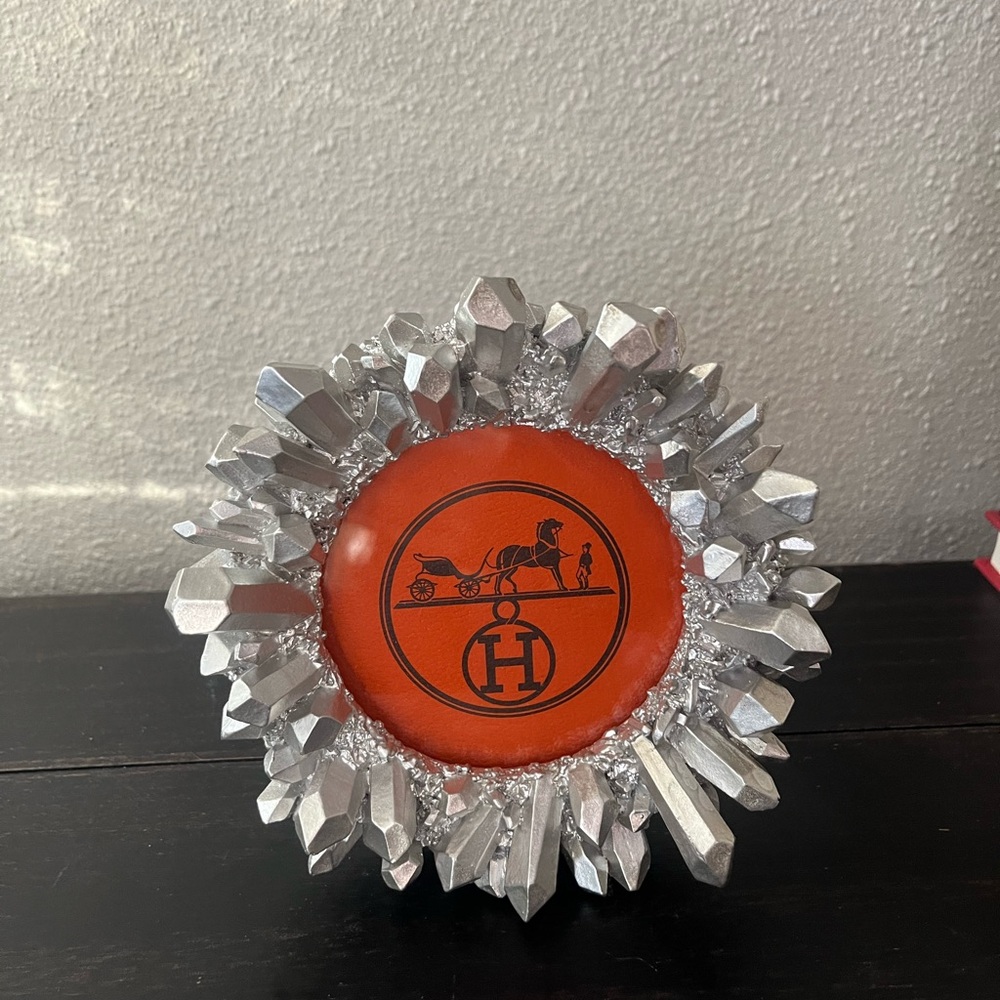 Round framed Hermes table art